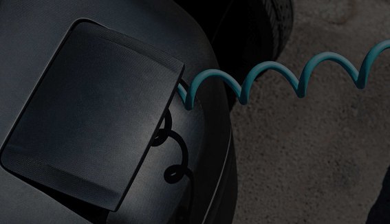 An electric car connected to a charging point