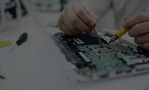 Engineers assembling power electronics on the Sinepower production floor